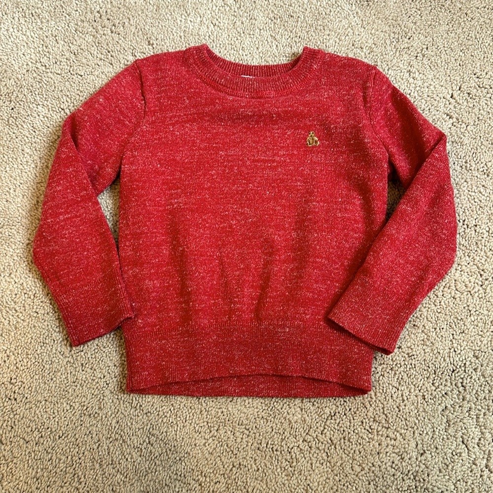 Boy’s red sweater